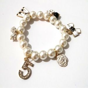 WOMENS LUXURY BRACELET FLOWER/BOW BLACK WHITE